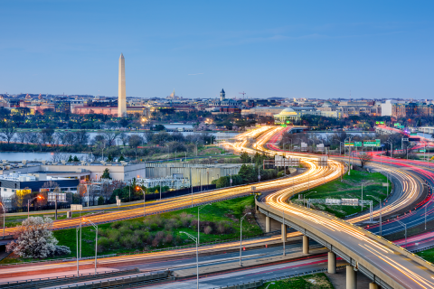 Washington, DC skyline of monuments and highways, as seen from Arlington, Virginia.
